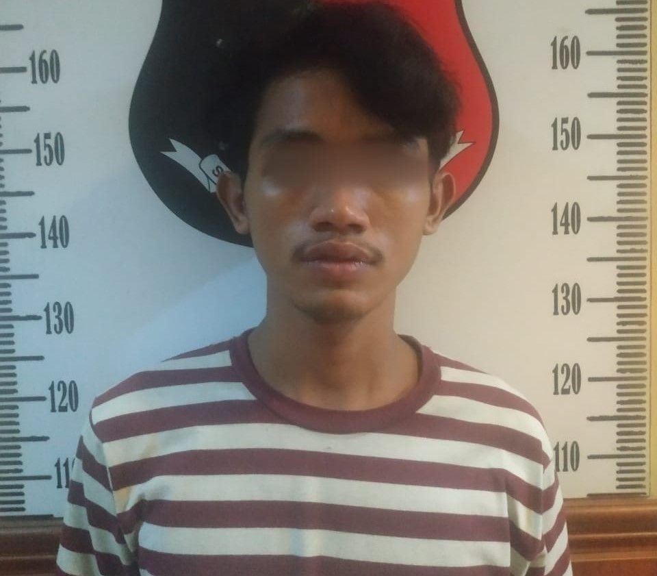 Wajah pelaku pencurian laptop.