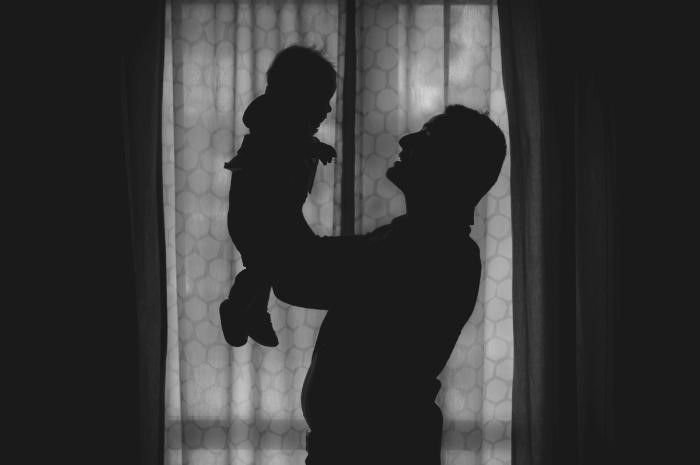 Ilustrasi ayah dan anak.